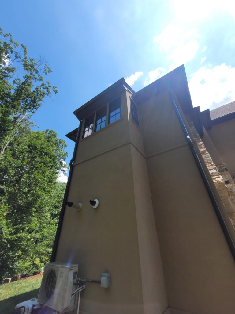 High tower windows on luxury WNC home — water-fed pole reach